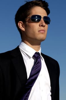 Close up view of a bunisess man in a dark suit.