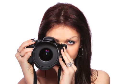 Young woman with DSLR isolated