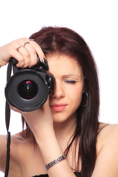 Young woman with DSLR isolated