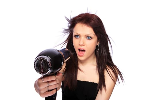 portrait of beautiful young woman with fashion hairstyle holding hairdryer 