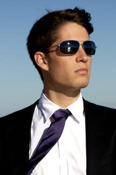 Close up view of a bunisess man in a dark suit.
