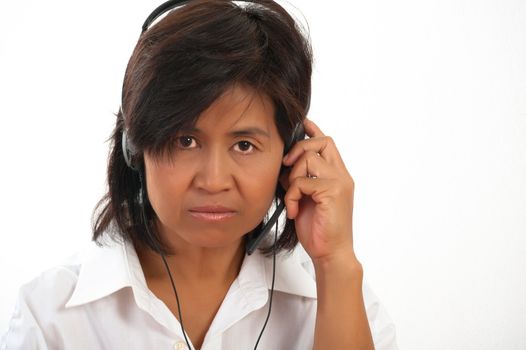 portrait of a young Asian woman with a headset