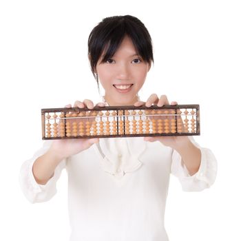 Chinese business woman holding traditional tool, abacus, closeup portrait against white.