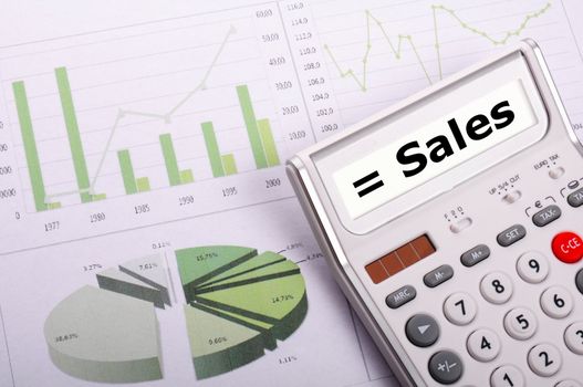 sales growht concept with business calculator on office