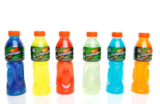 Bottles of Gatorade manufactured by Schweppes. Contains electrolytes and carbohydrates to rehydrate lost fluids and refuel muscles.  White background.  Flavours are: Fierce Grape, Lemon-Lime, Tropical, Lime Storm   Blue Bolt, Orange Ice.   Editorial use only.