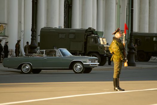 Old car at the rehearsal parade of victory. Palace (Dvorcovaja) square, against a background the Hermitage, Saint-Petersburg, Russia. 2008, april 24.