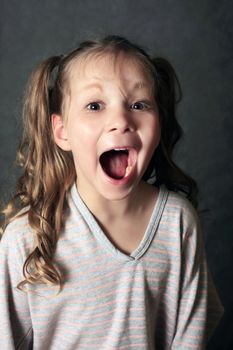 Portrait 5 years girls shouting in studio