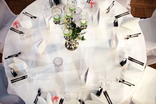 a festively decorated table in the restaurant - photographed from above
