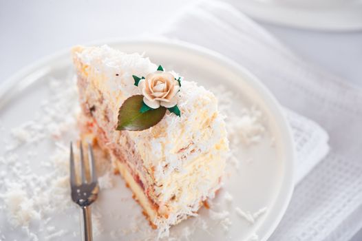 Coconut cake with vanilla and chocolate cream