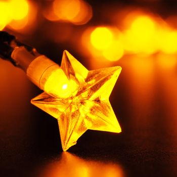 xmas or christmas holiday star lights with copyspace