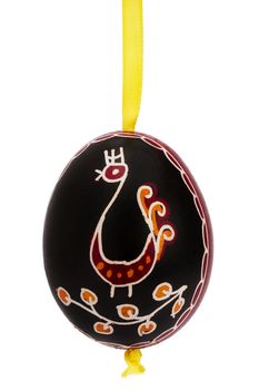 black hanging hand painted easter egg on white background