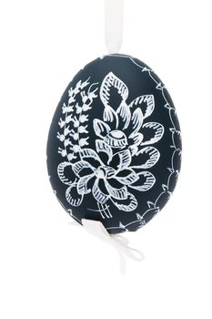 dark green hanging hand painted easter egg on white background