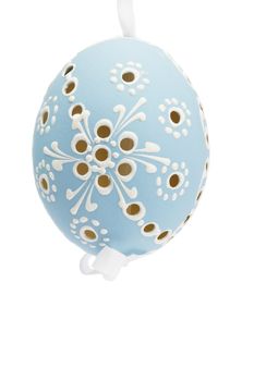 blue hanging hand painted easter egg on white background