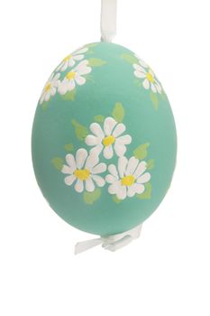green hanging hand painted easter egg on white background
