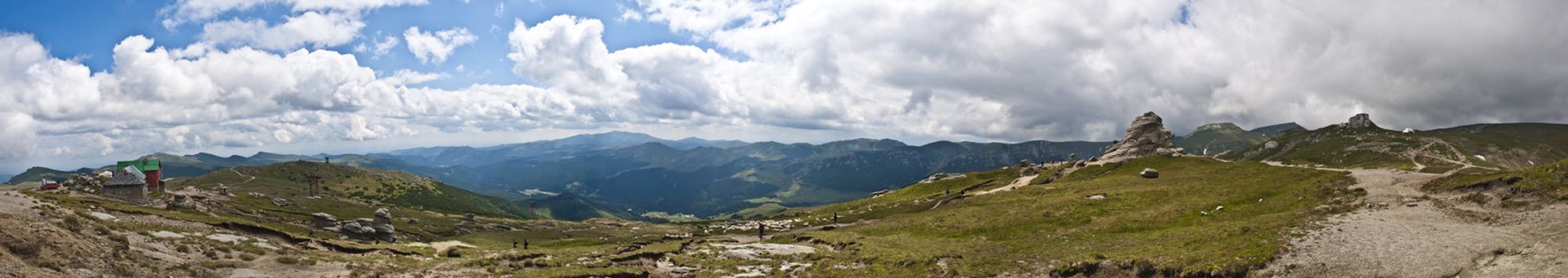 Panorama background in Carpathians. Beautiful mountains and landscape in Romania.