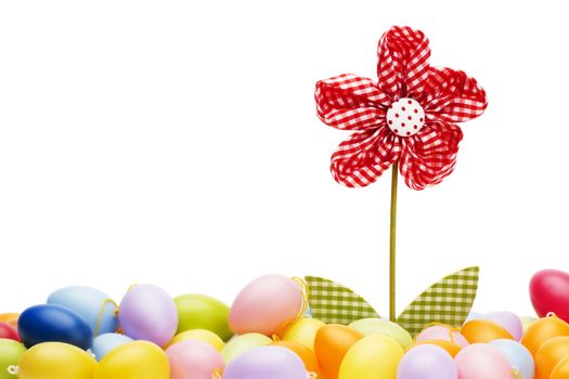 red drapery flower between easter eggs with white background