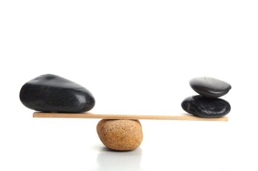 zen stone scales isolated on white background showing spa