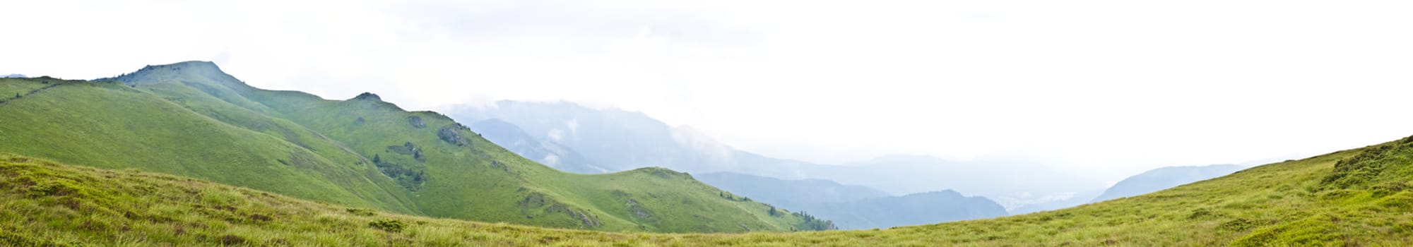 Panorama background in Carpathians. Beautiful mountains and landscape in Romania.