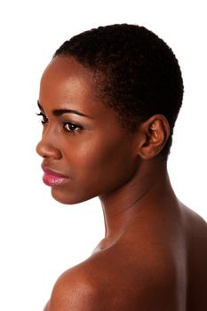 Face of a beautiful African woman with good smooth skin and short curly hair, isolated.