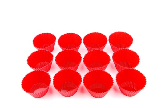 display of red plastic cups isolated on white background