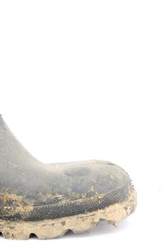 close-up on a farmer's boot isolated on a white background