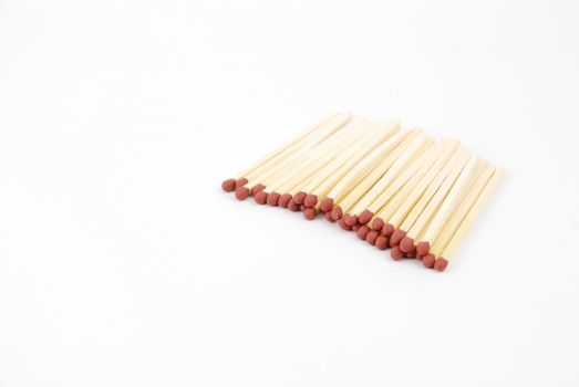 bunch of red matches isolated on white background