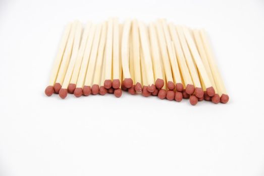 bunch of red matches isolated on white background