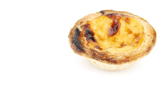 close-up of a delicious pastel de nata, typical pasty from Lisbon - Portugal (isolated on white background)