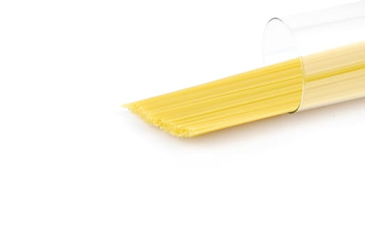 italian long spaghetti pasta on a glass container isolated on white background