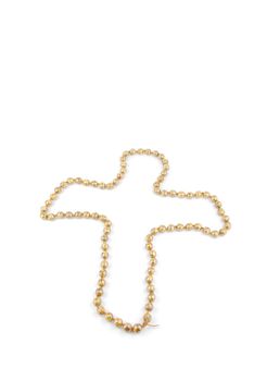 crucifix with a pearl necklace isolated on a white background
