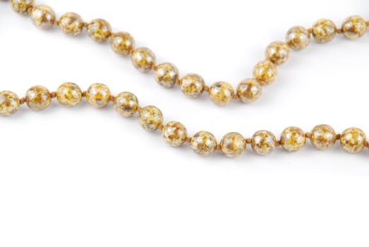 close-up on pearl necklaces isolated on a white background
