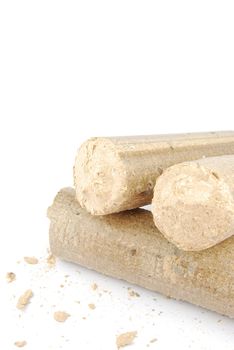 briquettes made of sawdust isolated on white background