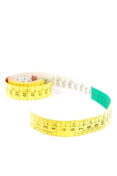 colorful measuring tape isolated on white background (shallow depth of field)
