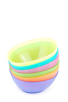 stacked colorful bowls isolated on white background