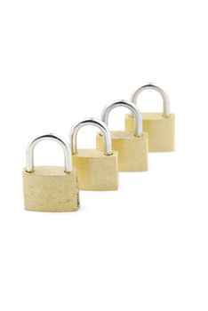 golden closed padlocks isolated on white background (focus on the first)