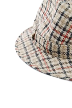 close-up of a checked brown hat isolated on white background