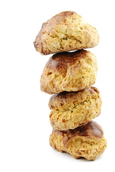 stack pile of traditional portuguese small pastries called saints cakes (isolated on white background)