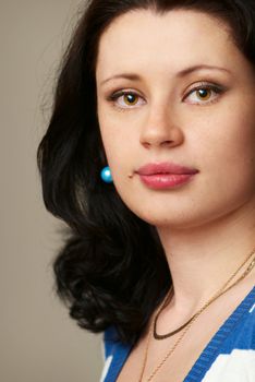 Close-up portrait of attractive young woman with ephelidess