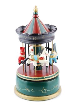 beautiful wooden antique carousel toy with animals (isolated on white background)