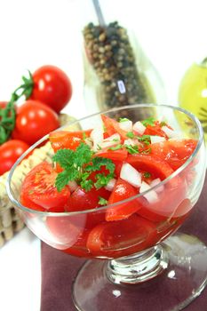 Tomato salad with fresh herbs and lemon balm