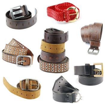 set of different leather belts isolated on white background