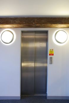 modern elevator on a antique residential building