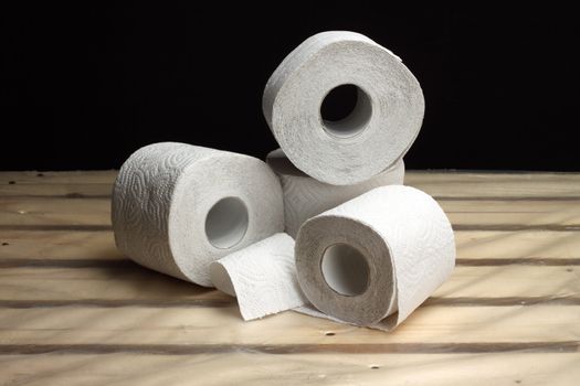 Stack of some rolls of white toilet paper