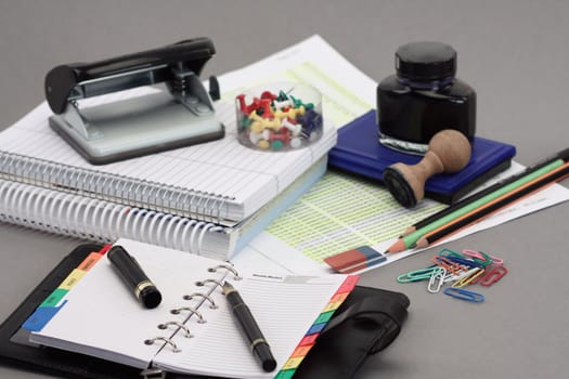 Office stationery over gray background 