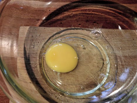 Photo presents egg - protein and yolk.