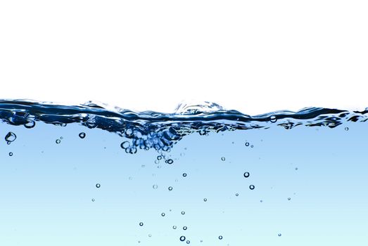 Isolated blue water splashing with bubbles and water drops - abstract blue background environmental theme