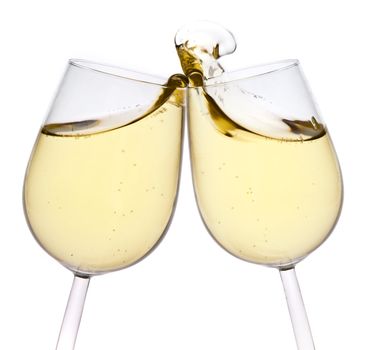 Merry Christmas and happy New year. Pair of champagne flutes making a toast, isolated on white background.