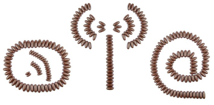 beautiful collection of 3 Internet symbols (rss feed, wireless antenna/connection, email) with chocolate candies (isolated on white background)