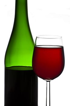 Bottle and glass of red wine isolated on white background