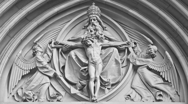 Stone statue jesus christ, god and angel on church in Olomouc city - Czech republic